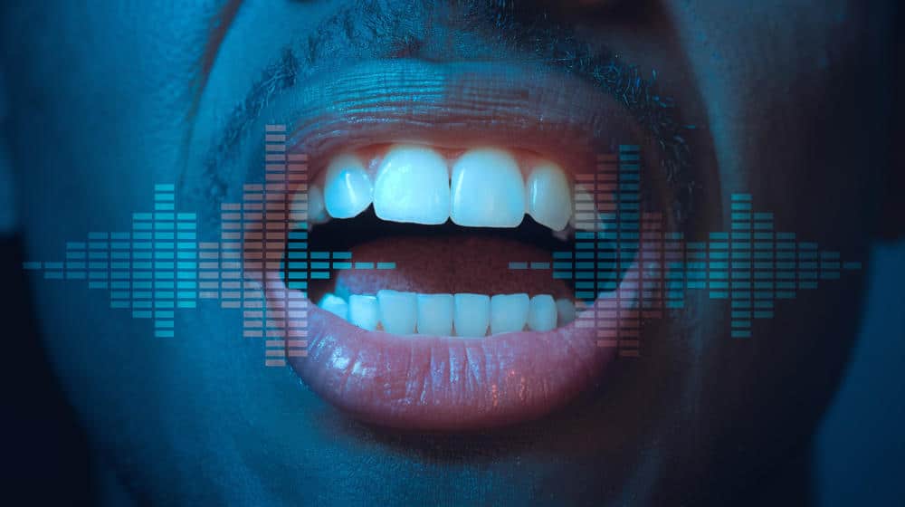 a male mouth with waveforms