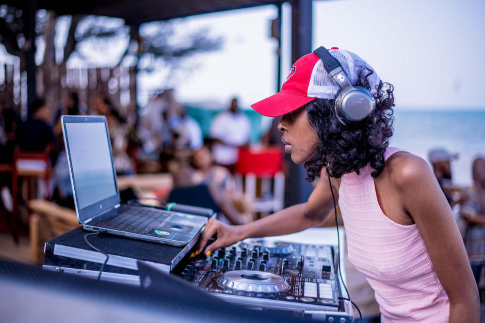 Female DJ Playing Music Gig